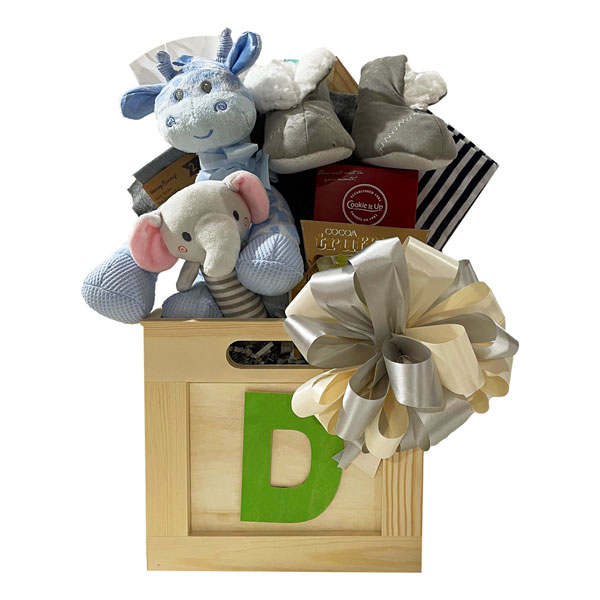 Baby Box Neutral- wooden ABC gift box (includes lid) is filled to bursting with gifts for Baby and Moms and/or Dads too! Inside you will find 2 pairs of socks, a plush animal, baby booties, a soft rattle, a onsie, receiving blanket and for the parents, chocolate truffles, herbal tea and a box of Cookie It Up shortbread