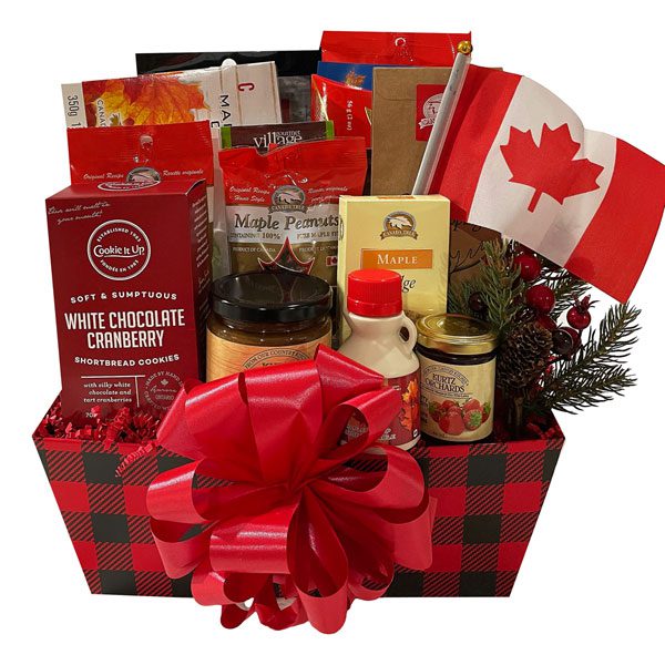 Canadian Christmas gift basket is filled with Canadian made gourmet foods from Gourmet Du Village, Kurtz Farms, Laura Secord, Canada True