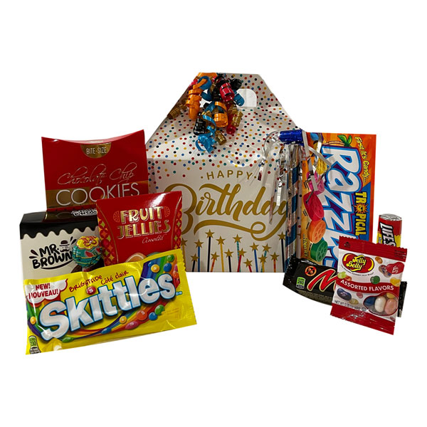 Happy Birthday Gift Pack with chocolate chip cookies, brownies, fruit jellies, Skittles, a lollipop, Razzles, Jelly Belly jelly beans, a Mars bar, Life Savers and a party horn