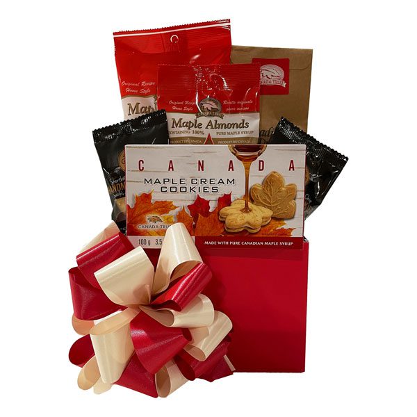 Maple Leaves Gift Basket with Canadian maple popcorn, moose droppings, pure maple candies, maple almonds, maple cream cookies and 2 chocolate chip shortbread.