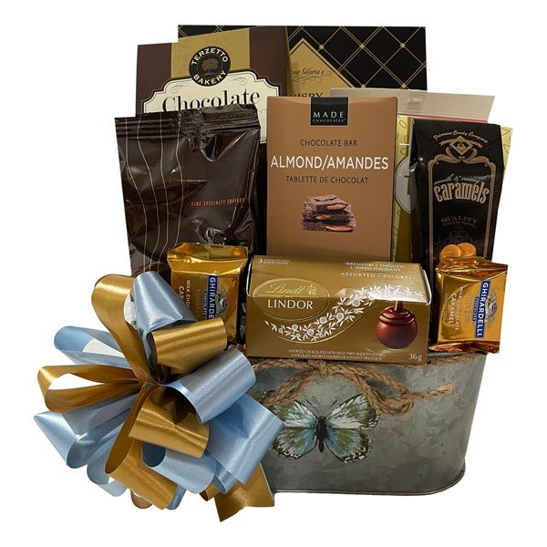 Pretty Petals Gift Basket with sugar cookies, Terzetto chocolate salted caramel cookies, breakfast tea, a Made jumbo almond chocolate bar, Primrose caramels , Claeys old fashioned candy drops, Lindt truffles, gourmet coffee, Ghirardelli chocolates