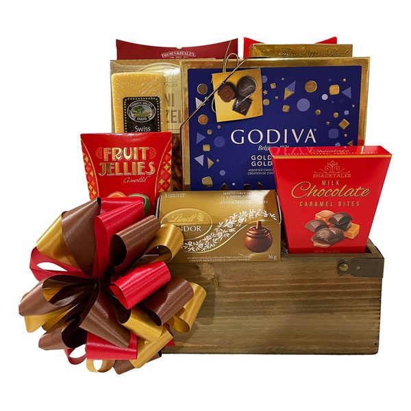 Uptown-This highly popular gift basket contains a gift box of Godiva truffles (11 pc), a bag of almond roca, chocolate chip cookies, 3 pepper blend crackers, a brick of cheese, mini pretzels, fruit jellies, Lindt truffles and caramel bites