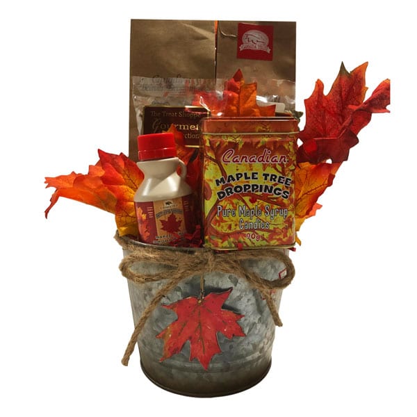 Canadian Made Gift Basket with gourmet maple pumpkin seeds, maple syrup, a tin of maple candies, beaver droppings, moose droppings and oven roasted maple pecans