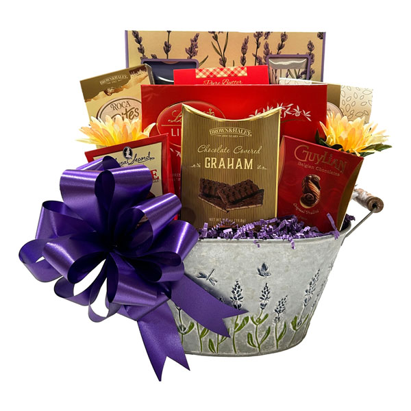 Hint of Lavender Gift Basket-Somerset gift set of body wash, body lotion and hand cream,, a box of buttery shortbread, a gift box of Lindt truffles (10 pc), almond roca bites, breakfast tea, chocolate graham, Laura Secord fudge and Guylian truffles