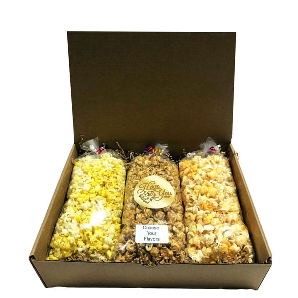 I Love You Popcorn Trio-filled with your choice of flavors, 10 cups per bag. Arranged and shipped in a gift box.