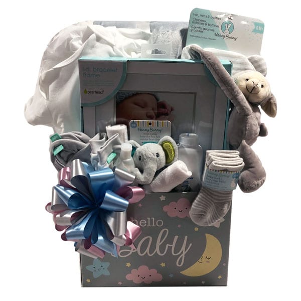 Starlight and Moonbeams Baby Basket-filled with a plush reversible blanket, Gerber onsie, Id bracelet picture frame, Johnson & Johnson, hat, mitt and booties set, plush toy, baby socks and face cloths