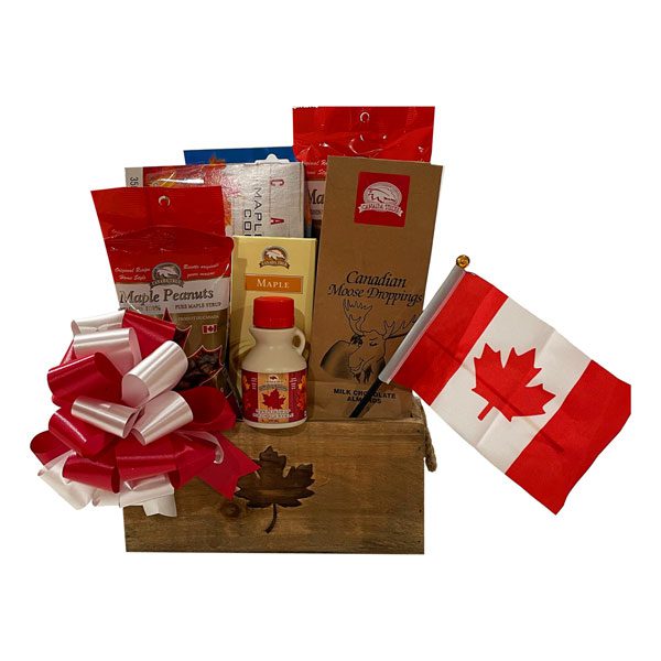 Tastes From Canada Gift Basket filled with maple peanuts, maple almonds, pure maple candies, mosse droppings, maple cookies, popcorn, fudge and syrup