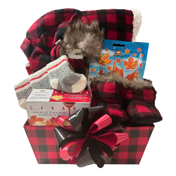 Canadian Baby Basket with red and black plaid furry hats, mitts, booties, fleece blanket, cabin socks and Canadian cookies and candies.