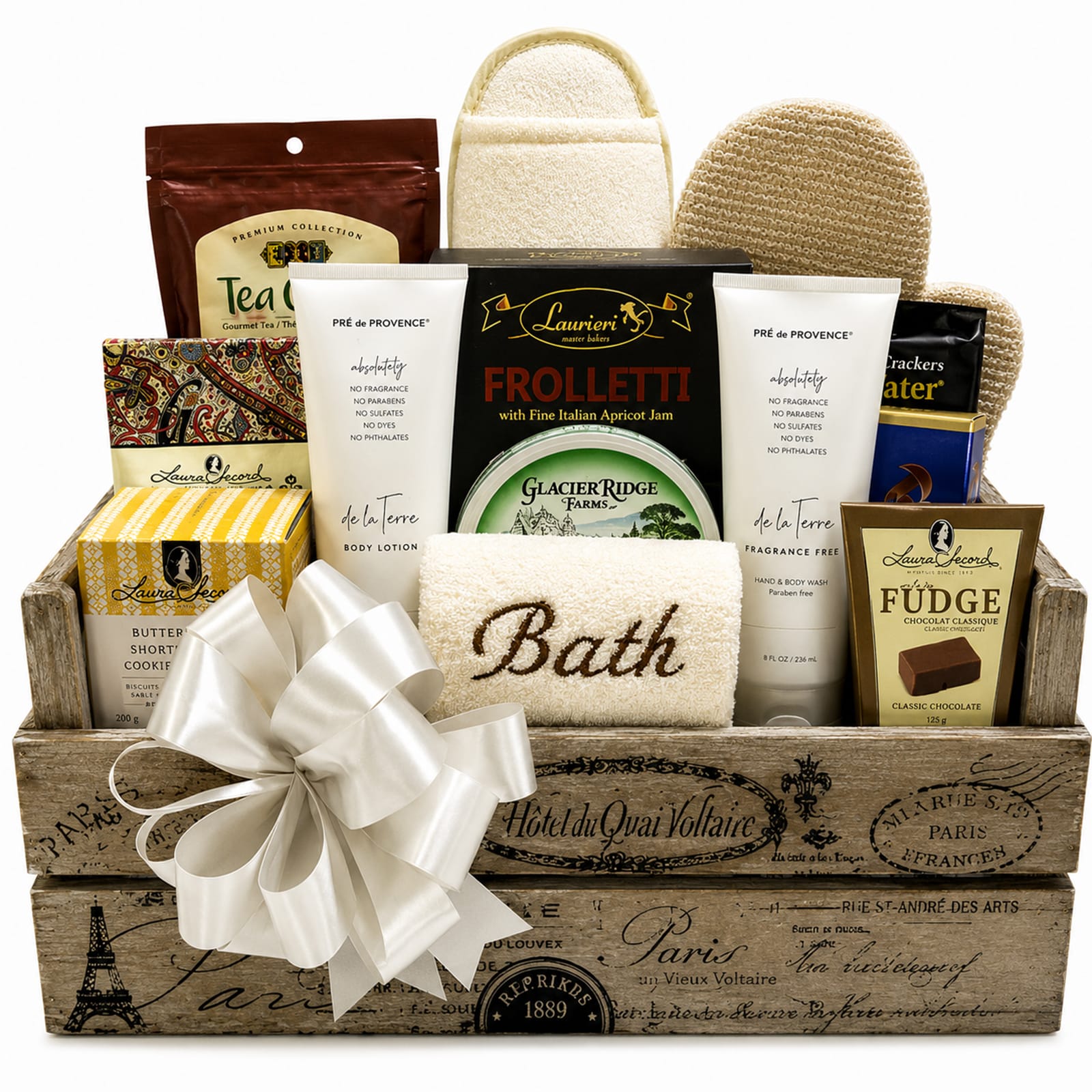 Naturally Unscented Bath Basket with Pre de Provence fragrance free body wash and lotion, tea candy, spa slippers, bath mitt, Scrocchi olive crackers, Frolletti chocolate cookies, Goplana toffees, lemon zest shortbread, garlic herb cheese, Laura Secord fudge, Godiva chocolate bar and a "BATH" sponge.