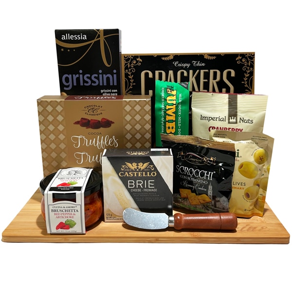 Beautiful charcuterie board filled with artisan meats, cheeses, nuts, and crackers