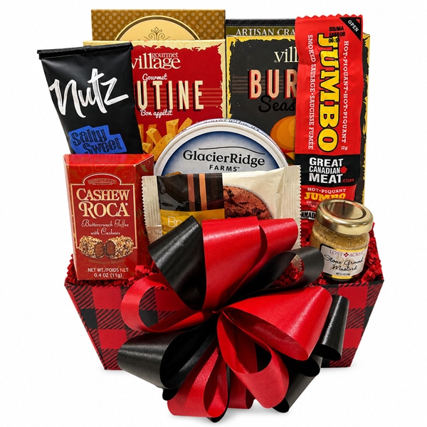 The Man Basket- Gourmet Du Village 3 peppercorn blend burger seasoning, Gourmet Du Village poutine seasoning, Partners olive oil and sea salt crackers, Glacier Ridge white cheddar cheese, a brownie cookie, Sweet and Salty nuts, Brown and Haley cashew roca, jumbo sausage, mini pretzels and dipping mustard.